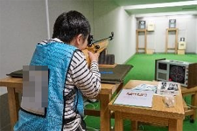 Child experiencing shooting practice